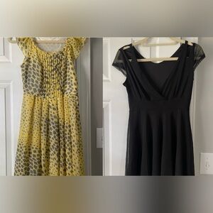 Two for $8. buy one and get the black dress free. Used Yellow and black Dress.